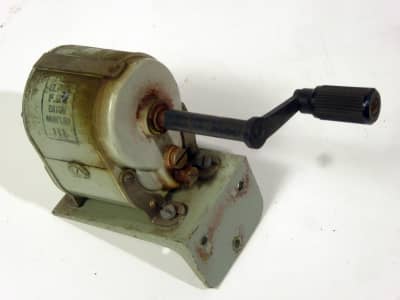 Small turquoise electrical hand generator