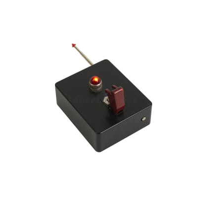 Handheld remote control detonator box prop with telescopic aerial, safety flip-up switch & lamp