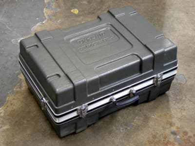 Ruggedised, ribbed grey plastic flight case