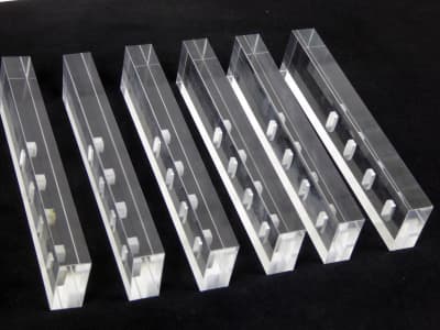 Shiny perspex blocks with cutouts