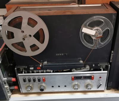 Fully practical 1970s reel to reel tape recorder with black & silver panel & teak sides