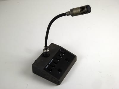 Black & dark grey desk console microphone with bendy/goose neck & multiple buttons.