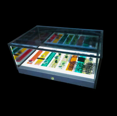 SciFi looking illuminated light box with bottom lit drawer and technical looking components 