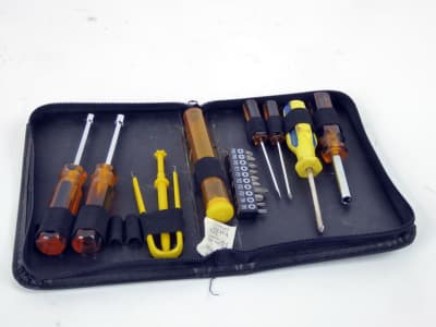 Small zip-up electronics tool case with nut spinner, screwdrivers