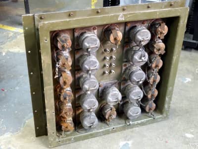 Heavy duty Russian military electrical connector panel with chain-tethered protective covers