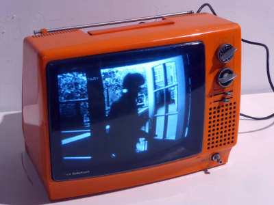 Practical 1973 black & white 12" CRT TV in stylish 1970s orange plastic case