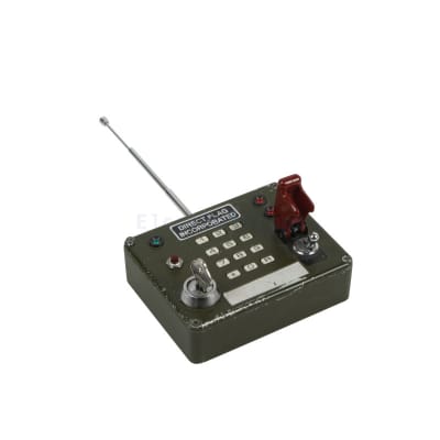 Practical khaki radio detonator/remote control with LEDs, keyswitch & telescopic aerial