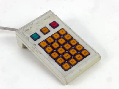 Sloped keypad with bold orange, green, red keys