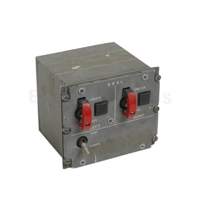 BRSL (Bomb Release Safety Lock) aircraft panel with red cover protected toggle switches