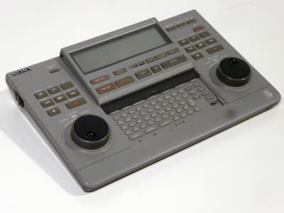 Small grey Sony video editing & titling controller with twin jog-dials, keyboard & LCD screen