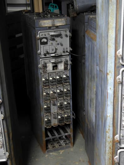 Genuine Soviet/cold war era radio transmitter rack with repeating plugin modules.