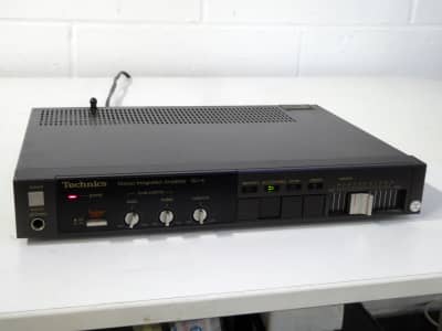 Compact 1990s Technics hi-fi audio amplifier