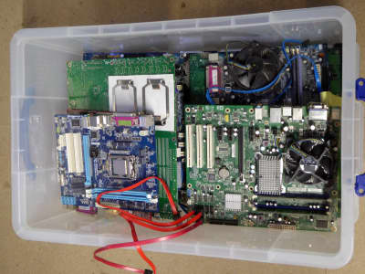 Large crate of colourful mixed motherboards, daughterboards & other PCBs