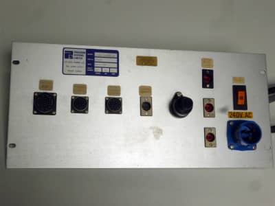 Silver control panel with power connectors, switch & round military connectors