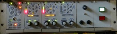 Light grey practical panel with round LED clusters
