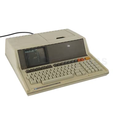 Part practical 1980s laboratory computer with small screen