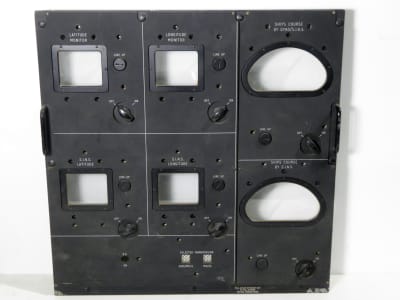Large black military navigational control panel with crescent & rectangle windows