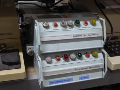 Military teletype interface controllers in admiralty blue