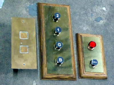 Selection of brass lift control panels