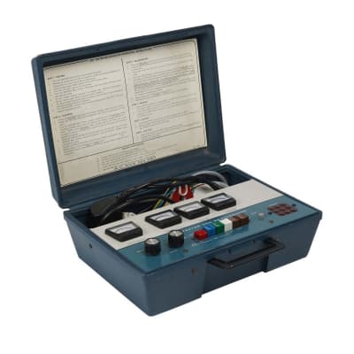 Practical control panel in portable case with meters, knobs, coloured buttons & lamps