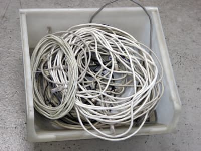 Small crate of white & beige computer cables