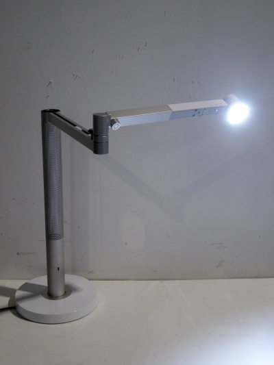 Practical stylish hi-tech table lamp, fully adjustable