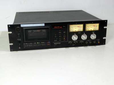 Practical black rack mount cassette tape deck, illuminated VU meters