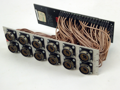 Multiple circular connectors with woven copper coloured umbilical cables