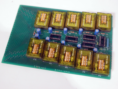 Printed Circuit Board with repeating transparent acid yellow relays