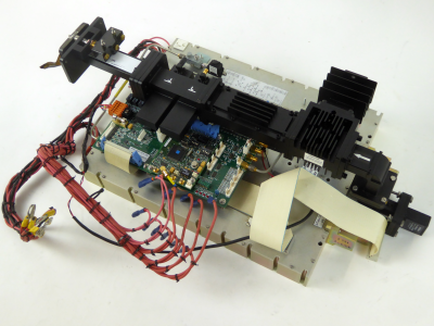 Complex modern microwave transmitter electronics, coloured wiring, black wave guide