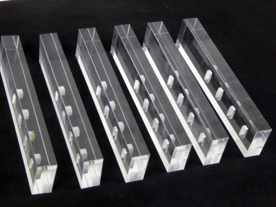Shiny perspex blocks with cutouts