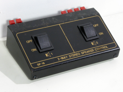 Speaker changeover switch console box