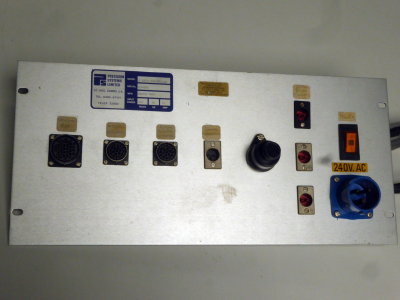 Silver control panel with power connectors, switch & round military connectors