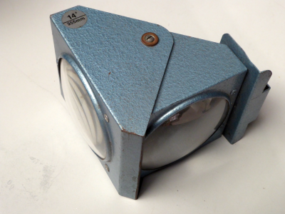 Direction changing lens assembly from OHP