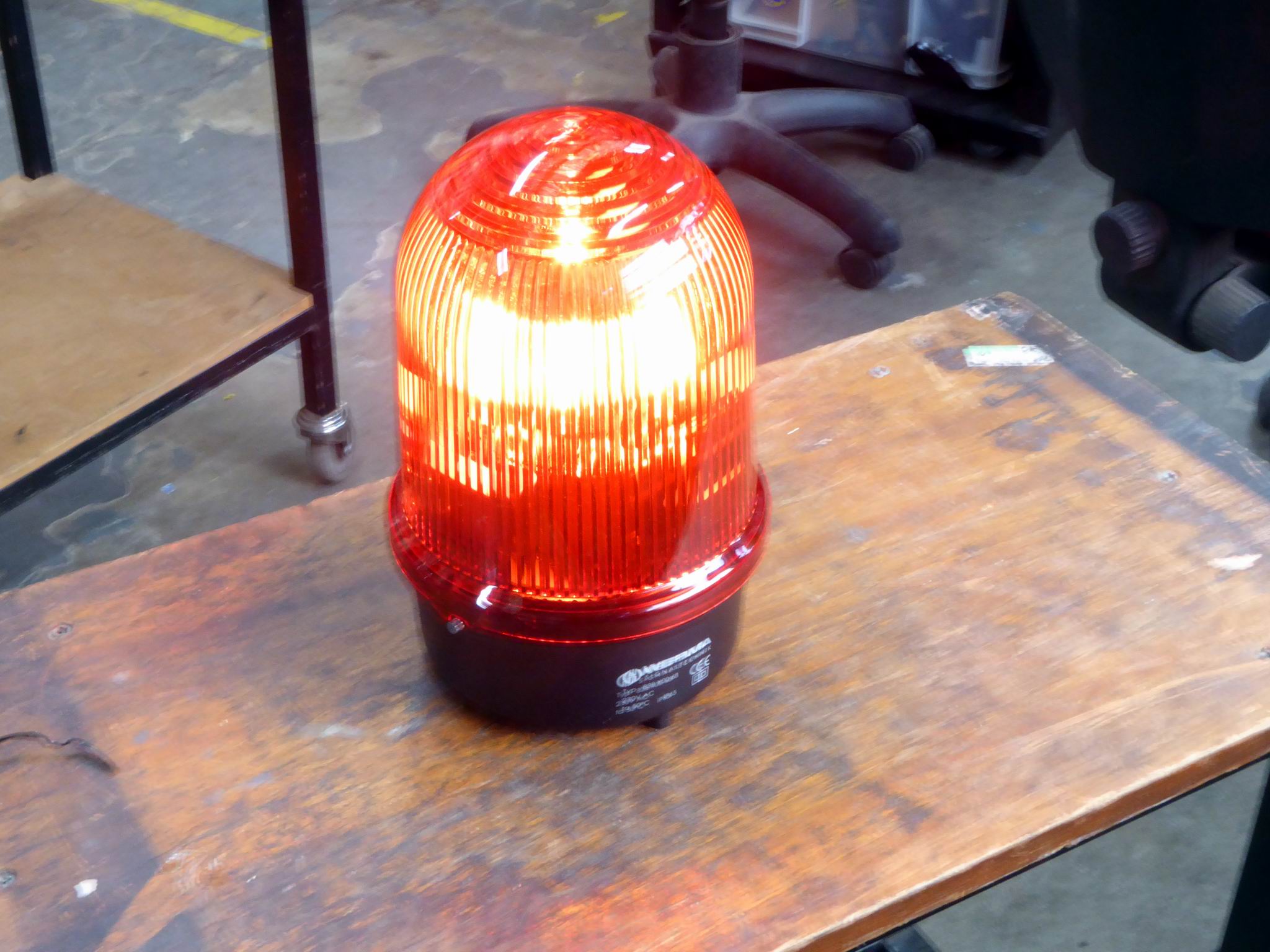 Xenon flashing domed red beacon light Electro Props Hire