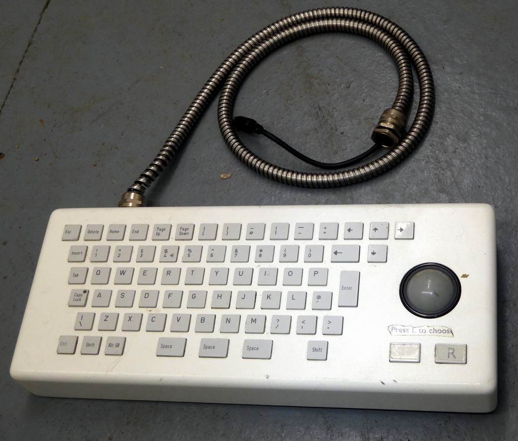 Robust vandal resistant practical keyboards with inbuilt trackball