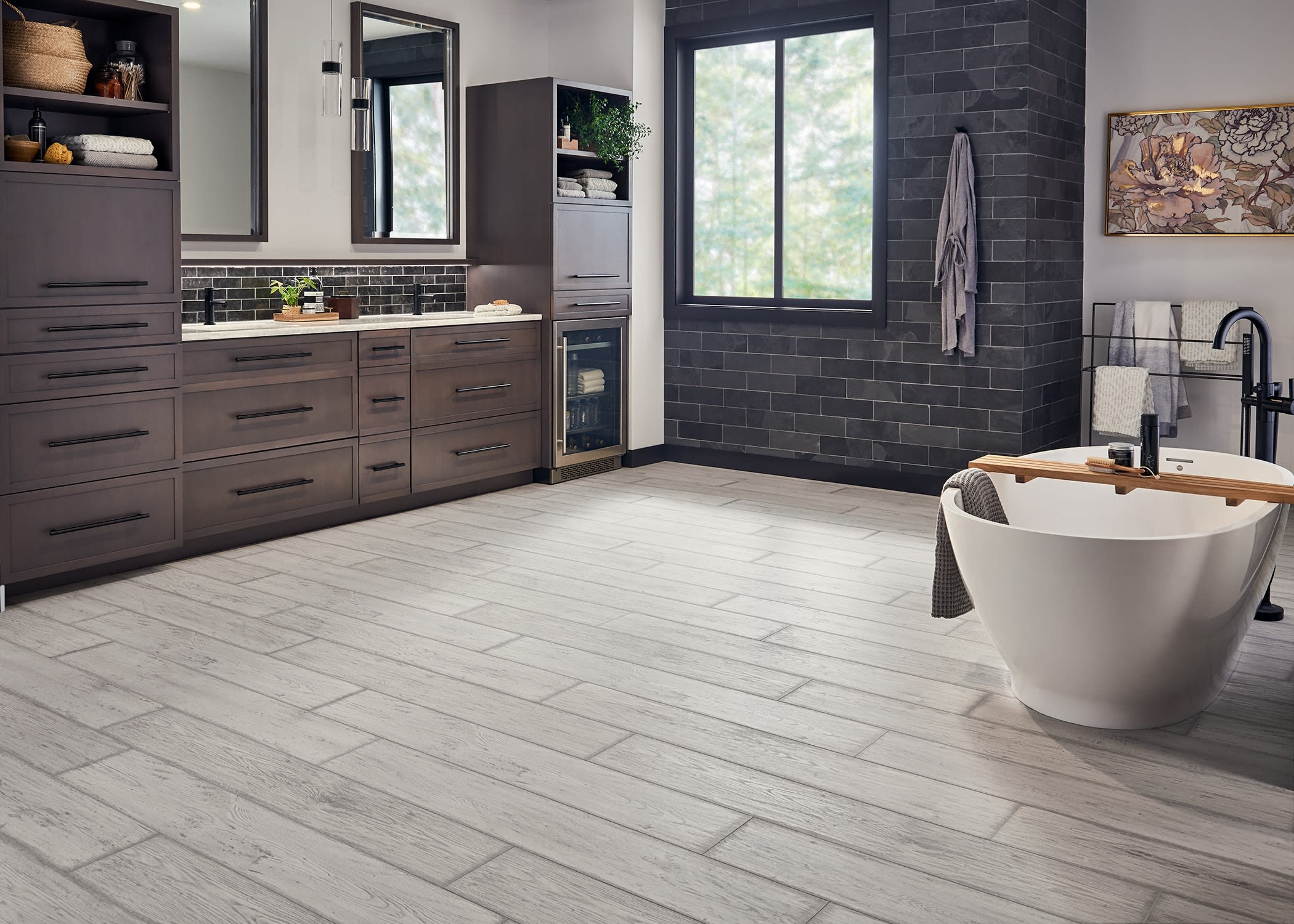 Stylish wood looks are possible for bathrooms like this, with San Dimas Oak Water-Resistant Laminate Flooring.