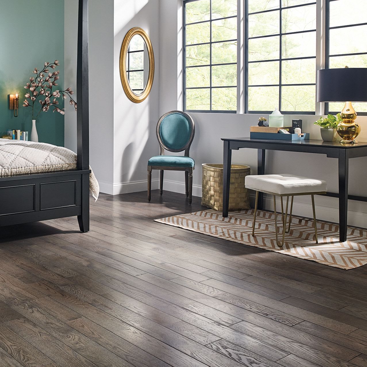 Sunlight pours into this bedroom with 4-Post Bed and Slate Oak Solid Hardwood Flooring from LL Flooring