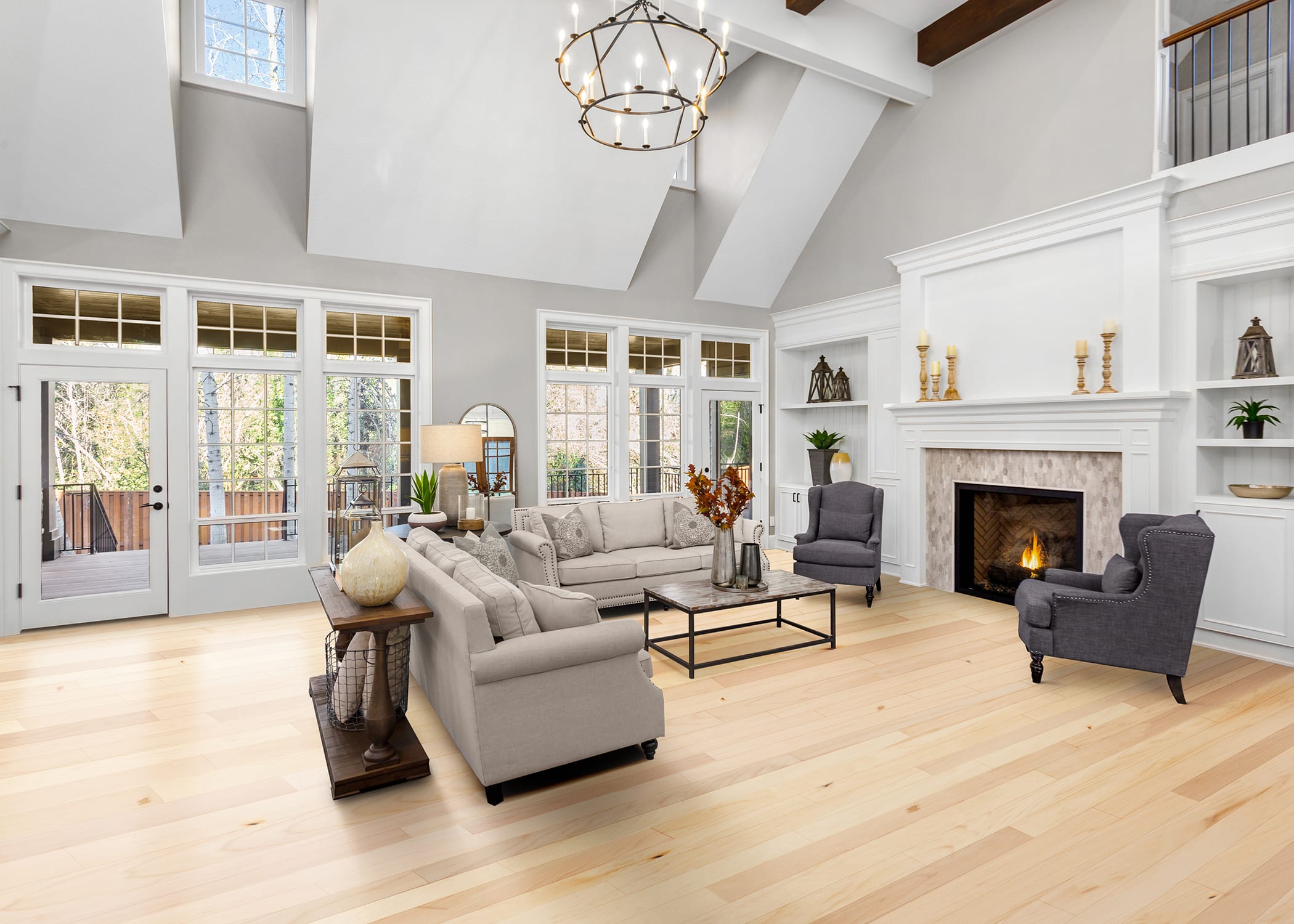 living room with the bright colors of maple wood flooring