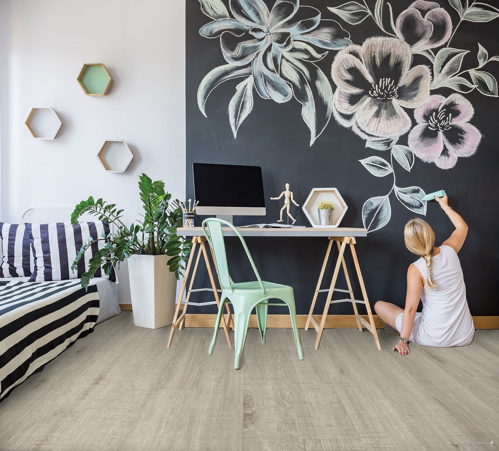 This colorful workspace is sure to inspire with artistic flair. This workspace features Eclipse Oak XTend water resistant laminate flooring from LL Flooring.