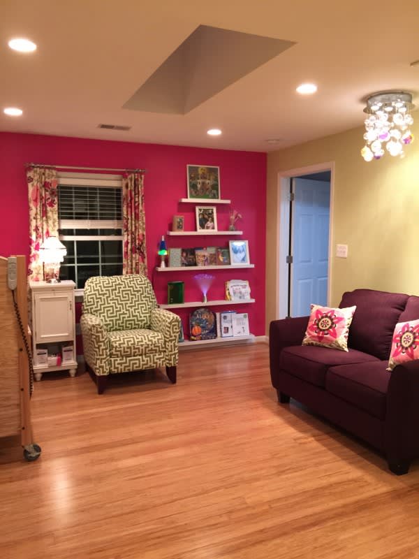 red walls in a room with new flooring