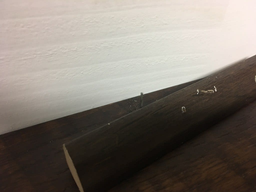 screws have been drilled through trim