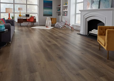large open Living Room with accents and art with bright colors 5mm w/pad Carson City Oak Waterproof Rigid Vinyl Plank Flooring