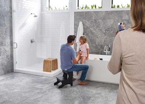 family in a tiled bathroom