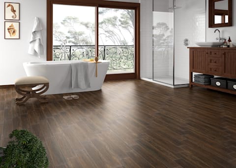 This bathroom has a luxurious oak look with waterproof Avella 6 in. x 36 in. Autumn Oak Porcelain Tile.