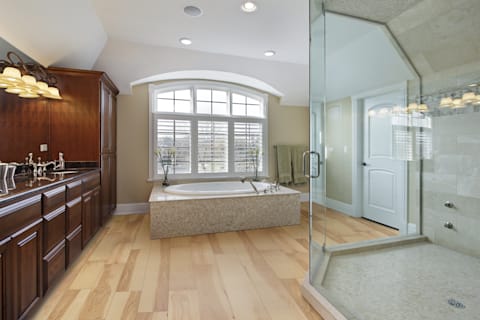 Engineered hardwood can be installed in bathrooms like this.