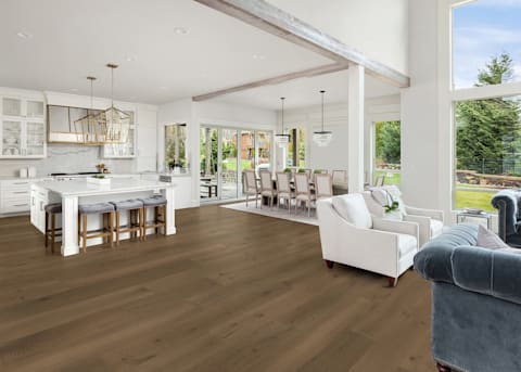 open concept living room with hardwood flooring