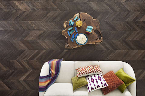 Patterned hardwood flooring like Manhattan Chevron gives style no matter the decor