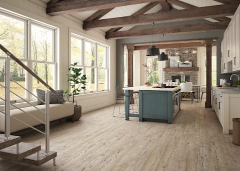 Amazing rustic flooring shown in this kitchen is CoreLuxe 'Old Port Pine' Rigid Vinyl Plank Flooring