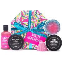 Winter Wonderland Gift pink white and yellow gift with green ribbon with potted black products and pink shower gel